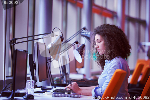 Image of young  business woman at office