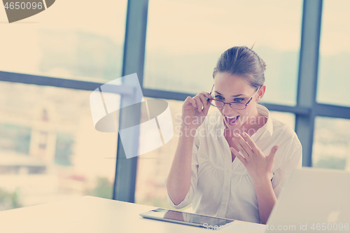 Image of business woman at  office