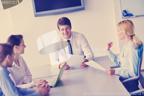 Image of business people in a meeting at office