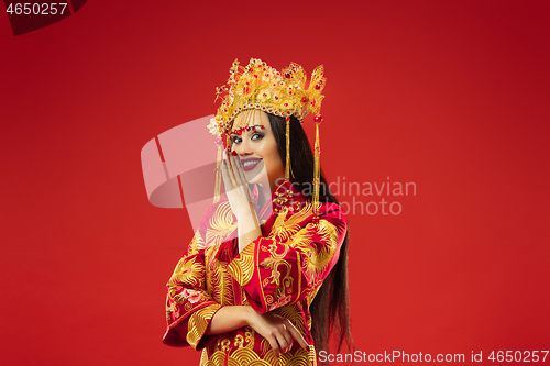 Image of Chinese traditional woman. Beautiful young girl wearing in national costume