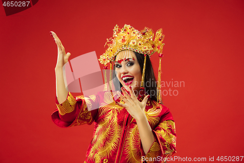 Image of Chinese traditional woman. Beautiful young girl wearing in national costume