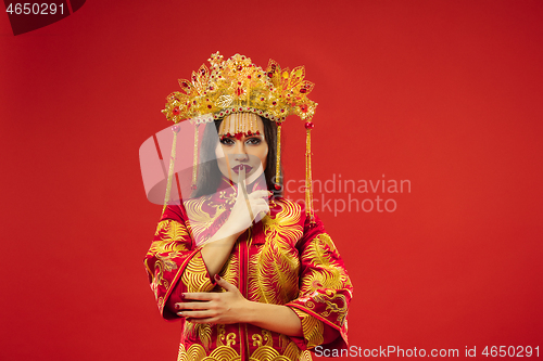 Image of Chinese traditional woman. Beautiful young girl wearing in national costume