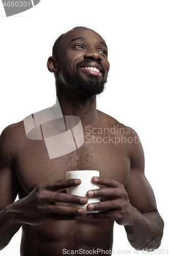 Image of African man with cup of tea, isolated on white background
