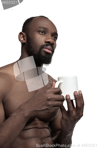 Image of African man with cup of tea, isolated on white background