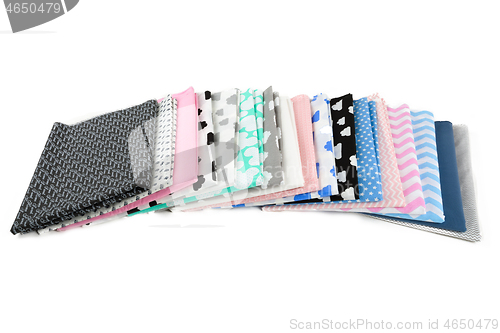 Image of Stack of cotton fabric material