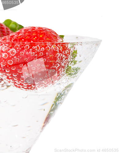 Image of fresh strawberry in glass with sparkling water