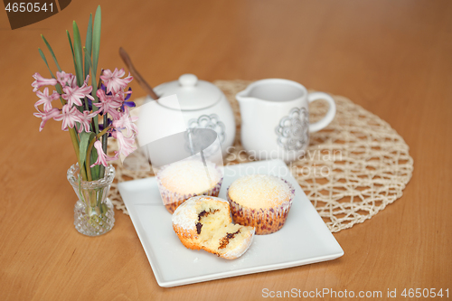 Image of fresh homemade Muffin on wooden table 