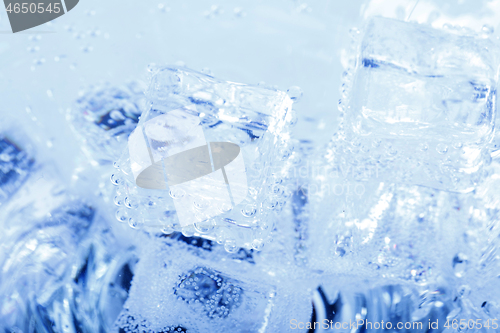 Image of backgrounds with ice cubes in sparkling water 