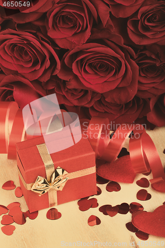 Image of Valentine gift and red roses, retro color tone