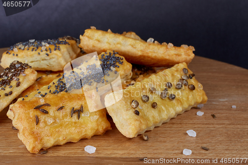 Image of baked sticks with caraway, poppy, chia seeds, salt