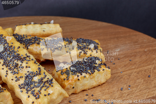 Image of baked sticks with poppy seeds, salt