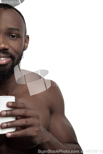 Image of African man with cup of tea, isolated on white background