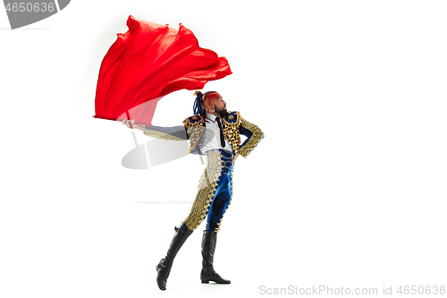 Image of Torero in blue and gold suit or typical spanish bullfighter isolated over white