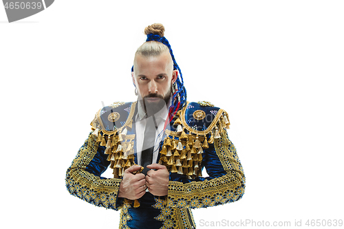 Image of Torero in blue and gold suit or typical spanish bullfighter isolated over white