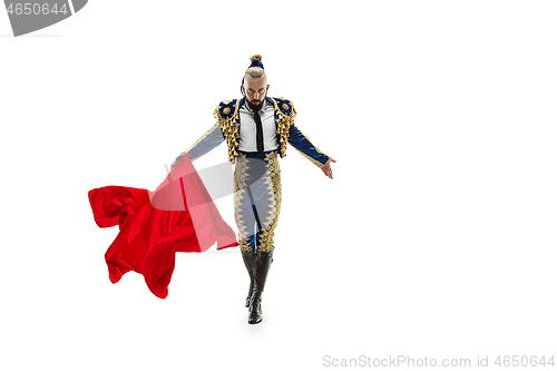 Image of Torero in blue and gold suit or typical spanish bullfighter isolated over white