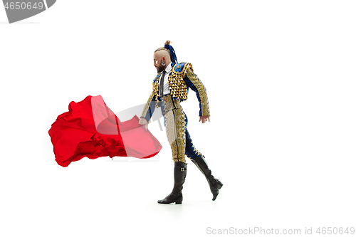 Image of Torero in blue and gold suit or typical spanish bullfighter isolated over white