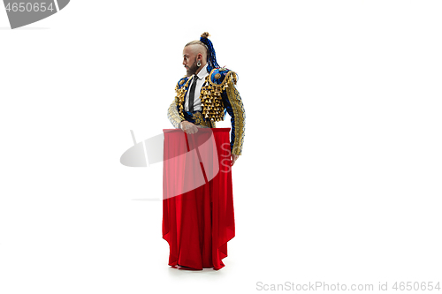 Image of Torero in blue and gold suit or typical spanish bullfighter isolated over white