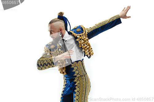 Image of Torero in blue and gold suit or typical spanish bullfighter isolated over white