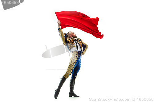 Image of Torero in blue and gold suit or typical spanish bullfighter isolated over white