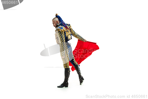 Image of Torero in blue and gold suit or typical spanish bullfighter isolated over white