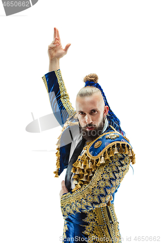 Image of Torero in blue and gold suit or typical spanish bullfighter isolated over white