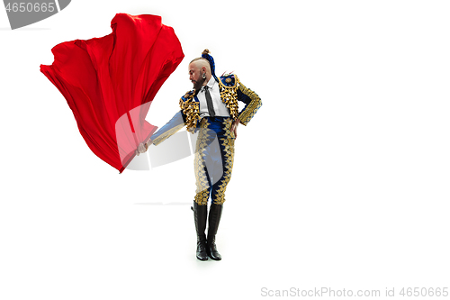 Image of Torero in blue and gold suit or typical spanish bullfighter isolated over white