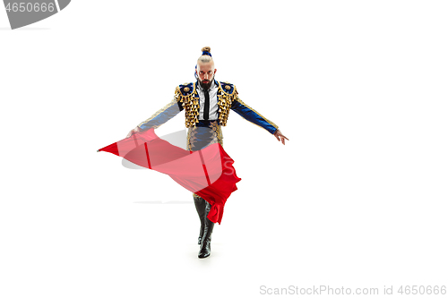 Image of Torero in blue and gold suit or typical spanish bullfighter isolated over white