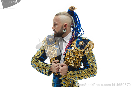 Image of Torero in blue and gold suit or typical spanish bullfighter isolated over white