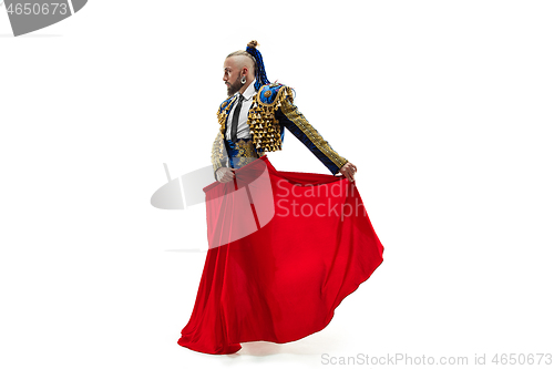 Image of Torero in blue and gold suit or typical spanish bullfighter isolated over white