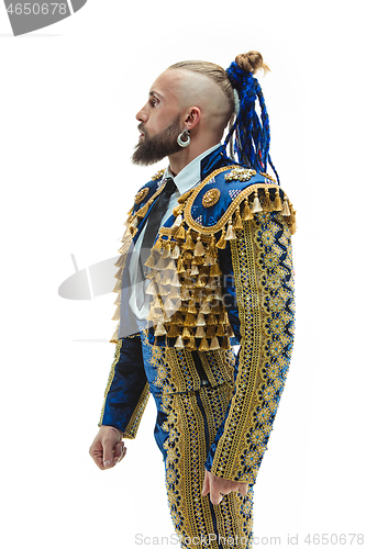 Image of Torero in blue and gold suit or typical spanish bullfighter isolated over white