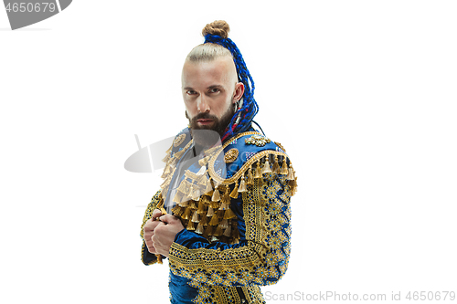 Image of Torero in blue and gold suit or typical spanish bullfighter isolated over white