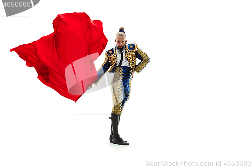 Image of Torero in blue and gold suit or typical spanish bullfighter isolated over white