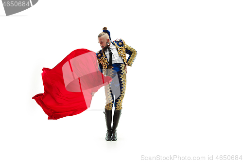 Image of Torero in blue and gold suit or typical spanish bullfighter isolated over white