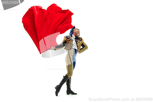 Image of Torero in blue and gold suit or typical spanish bullfighter isolated over white