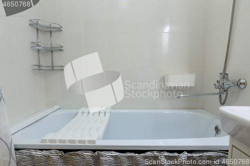 Image of Small cozy bathroom, view of the bath