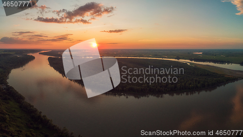 Image of Aerial drone view of river landscape in sunny summer evening