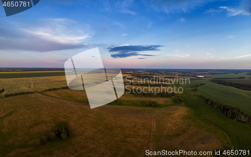 Image of Top aerial view of green fields and meadows