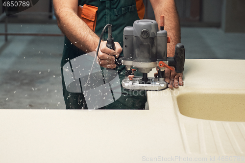 Image of Stone sink furniture production