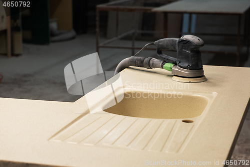 Image of Stone sink furniture production