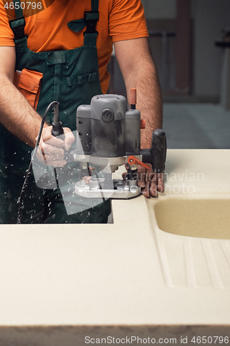 Image of Stone sink furniture production