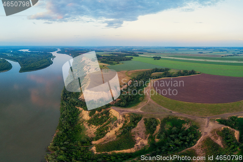 Image of Aerial drone view of river landscape in sunny summer evening