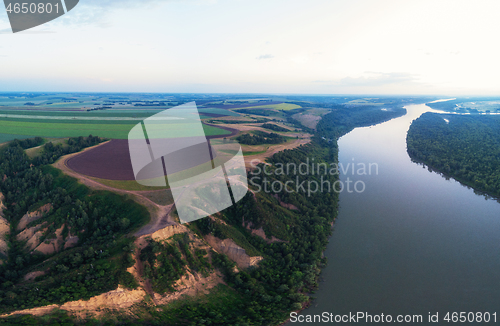 Image of Aerial drone view of river landscape in sunny summer evening