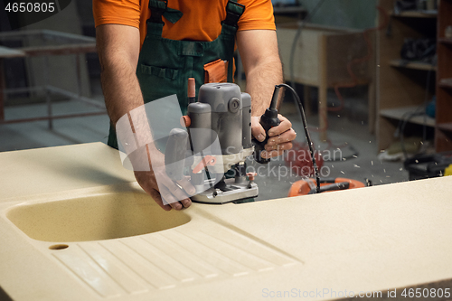 Image of Stone sink furniture production