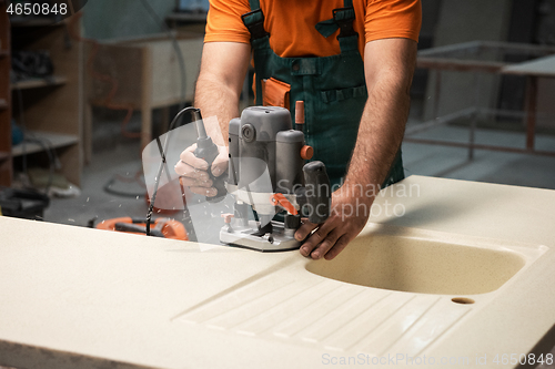 Image of Stone sink furniture production
