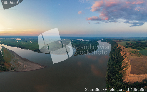 Image of Aerial drone view of river landscape in sunny summer evening