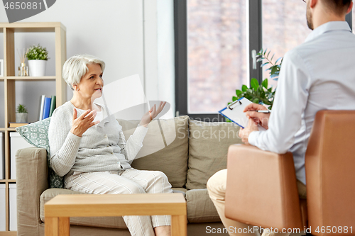 Image of senior woman patient and psychologist