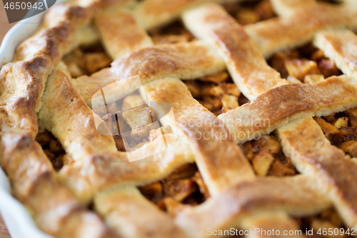 Image of close up of apple pie in baking mold