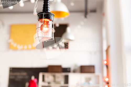 Image of close up of lamp at modern restaurant