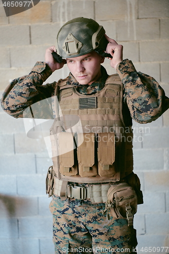 Image of soldier preparing