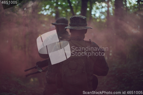 Image of Modern warfare Soldiers  Squad  in battle